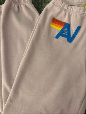 Aviator Nation Cream Sweatpants with Rainbow Stripe & Blue AV Patch
